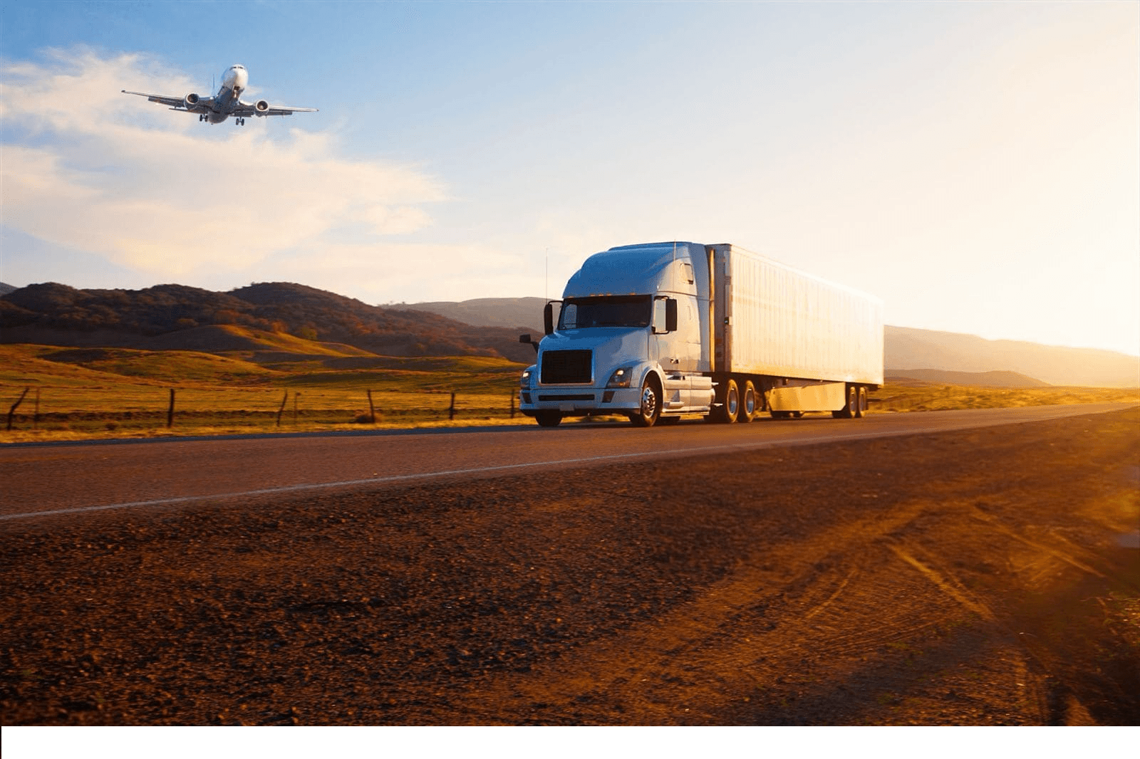 Aerial view of logistics trucks and cargo airplane representing ARCTAG Logix air and road freight solutions.